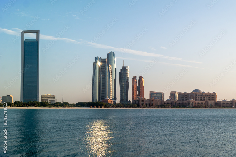 Fototapeta premium Beautiful view of Abu Dhabi city beach, famous Etihad towers and buildings