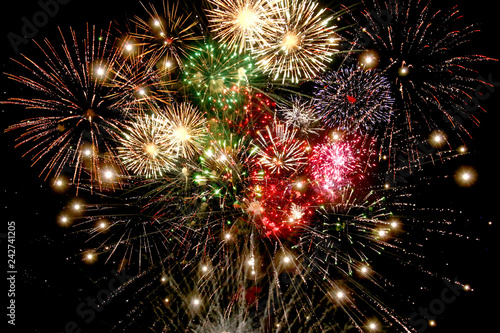 Beautiful colorful fireworks  for celebration on dark background , New year holiday concept