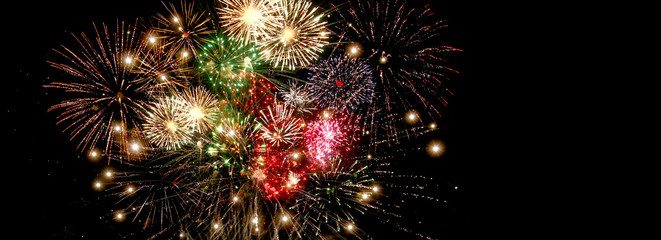 Beautiful colorful fireworks  for celebration on dark background , New year holiday concept