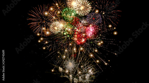 Beautiful colorful fireworks  for celebration on dark background , New year holiday concept