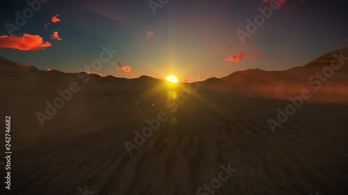 Black Hawk Helicopter crossing dessert against beautiful sunrise, 4K photo