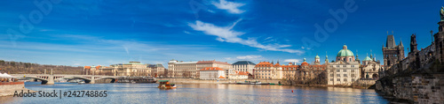 PRAGUE, CZECH REPUBLIC - APRIL, 2018: The beautiful old town of Prague city, the Vltava river and the iconic Charles bridge