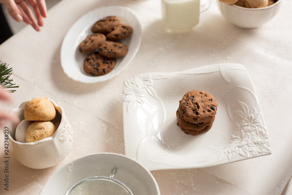 gingerbread in a white plate. chocolate chip cookies. dessert. candy gingerbread in a white plate. chocolate chip cookies. dessert. candy