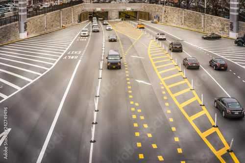 New York City tunnel with vehicles in multiple lanes