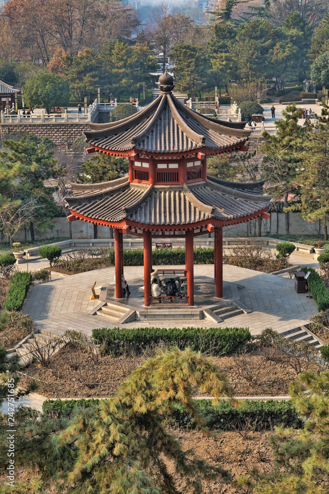 People in a Pagoda situated in a quiet meditation park