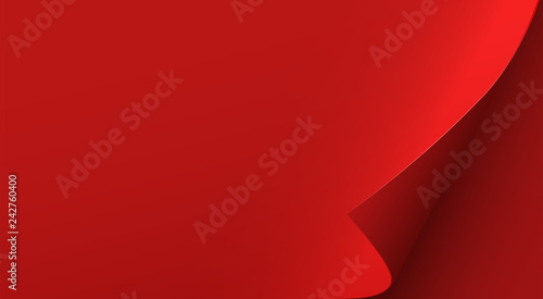 Red paper sheet with curled corner