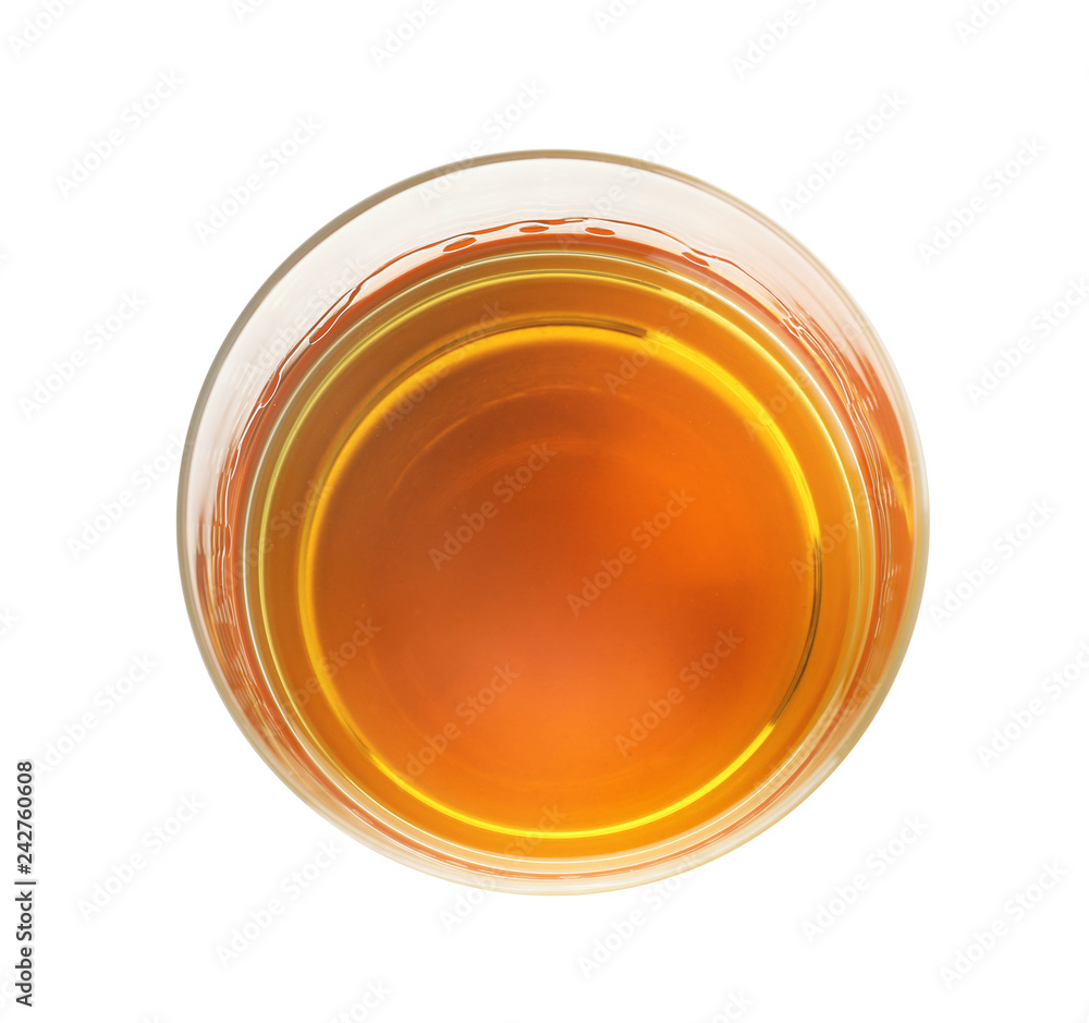 Glass of expensive whiskey on white background, top view Glass of expensive whiskey on white background, top view