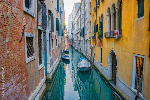 View of Canal with boats in Venice, Italy. Venice is a popular tourist destination of Europe.