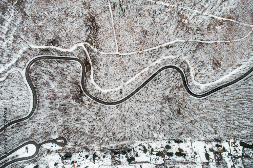 Winter road turns from above