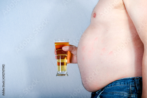 Shirtless overweight caucasian man