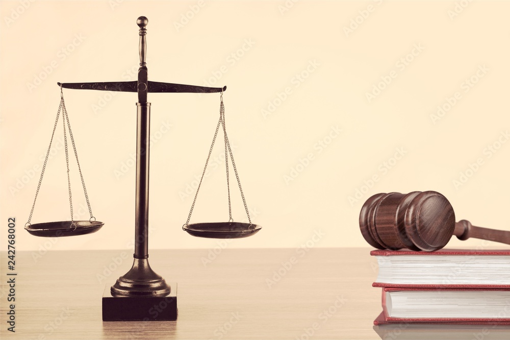 Law scales on table background. Symbol of justice Law scales on table background. Symbol of justice