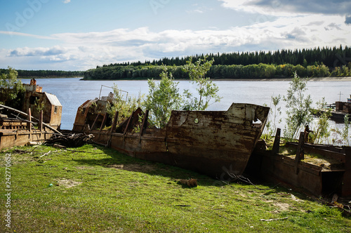Abandoned ship on the river Bank