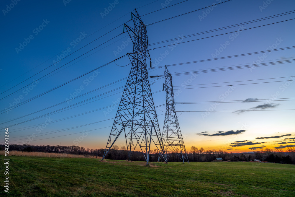 Electrical Transmission Towers and Wires at Dusk