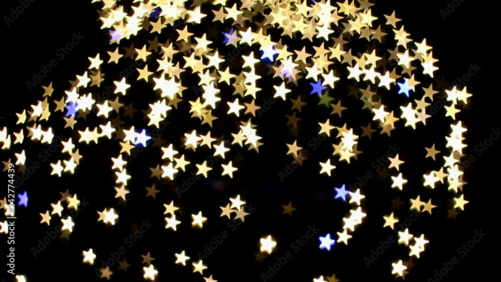 Star Shaped Bokeh Golden and Blue Blinking Lights Star Shaped Bokeh Golden and Blue Blinking Lights
