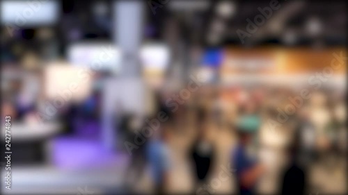 Wallpaper Mural People moving around convention center floor-Blurred clip for background use Torontodigital.ca