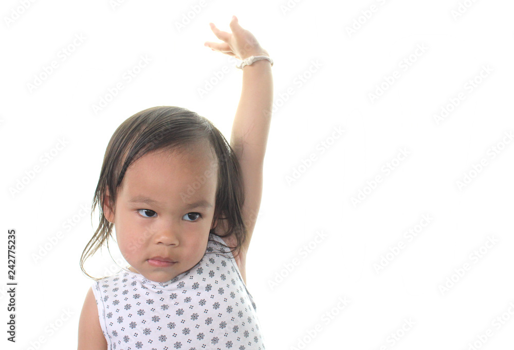 Little Asian girl raising hands up on white. Little Asian girl raising hands up on white.