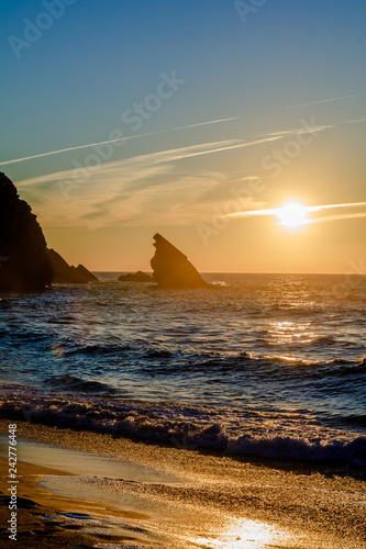 Por do Sol na Praia da Adraga em Sintra Portugal