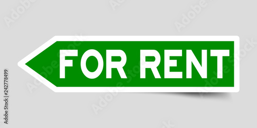 Arrow shape green color sticker in word for rent on gray background