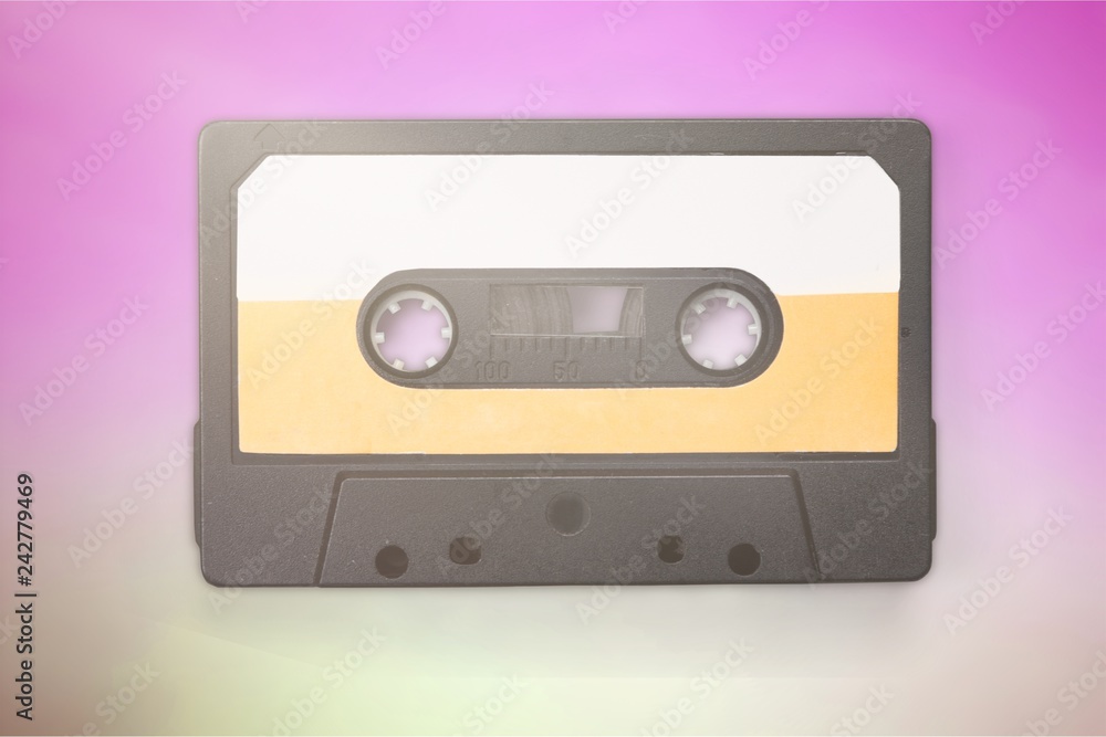 Old audio cassette isolated on white background