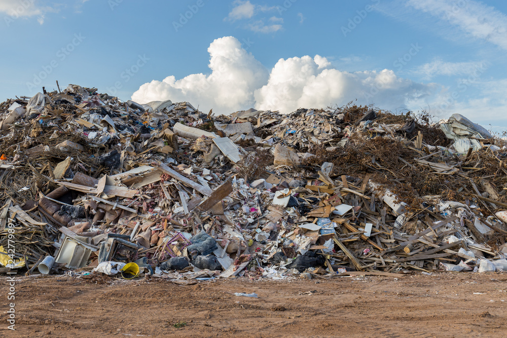 Obraz premium Three-story-high storm debris piles following devastating hurricane season 