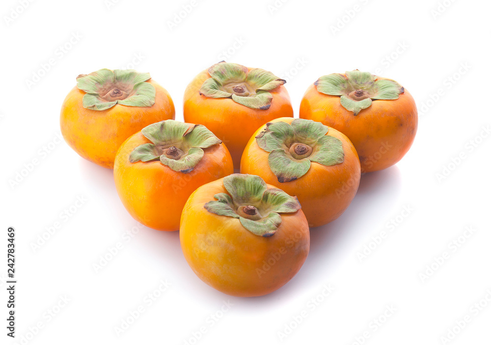 Tropical fruit persimmon. Kaki with leaves on white background. Tropical fruit persimmon. Kaki with leaves on white background.