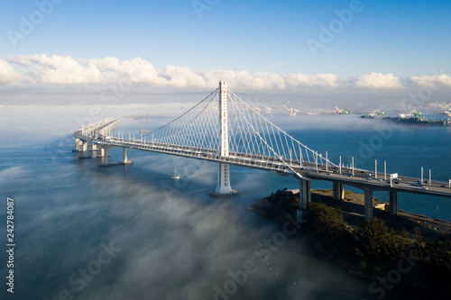 Valokuvatapetti San Francisco - Oakland Bay Bridge East Span With Low Fog in Background