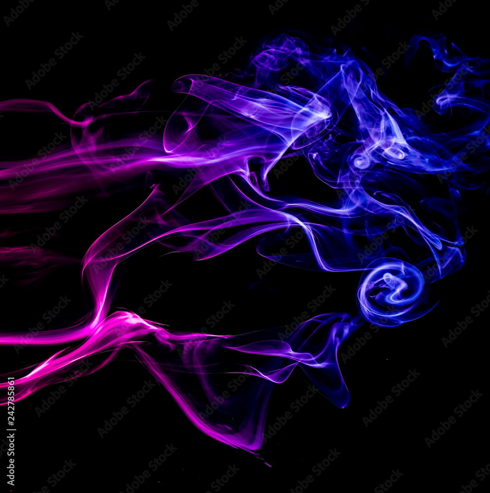 Colored smoke on black background Colored smoke on black background