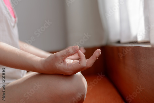 close up woman hand with relaxing yoga poses.