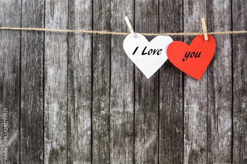 Valentine s hearts on a dark wooden background.