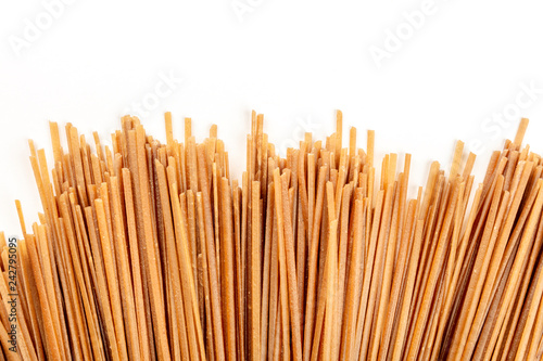 Wallpaper Mural Raw soba, dried buckwheat noodles, shot from the top on a white background with copy space Torontodigital.ca