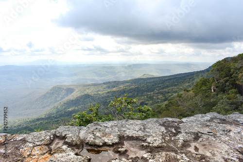 Rugged cliffs on foreground and clear sky view in the background at Phu Kra Dueng National Park, Loei Thailand.
