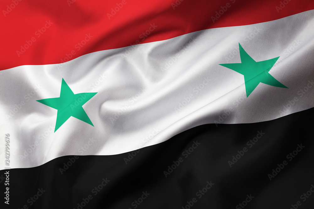 Satin texture of curved flag of Syria Satin texture of curved flag of Syria