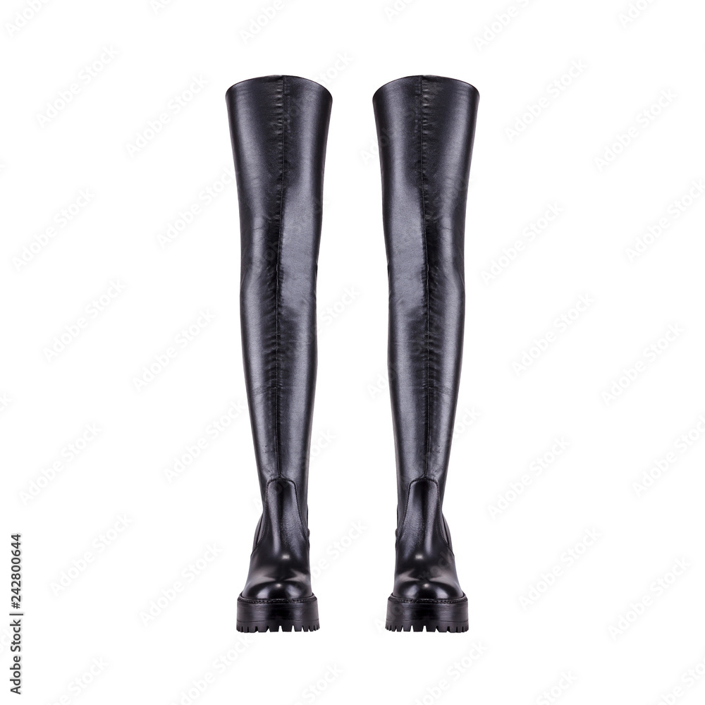 High women's leather boots above the knee on a white High women's leather boots above the knee on a white
