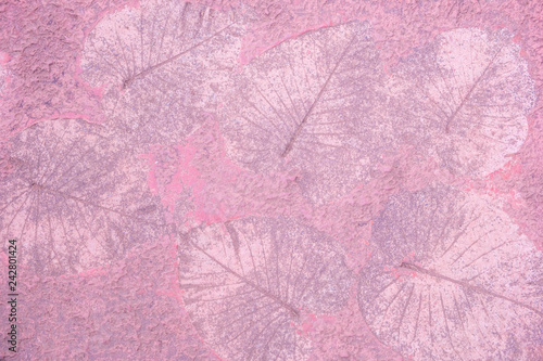 Blurred for Background.Pink cement floor with pattern surface made of leaves.