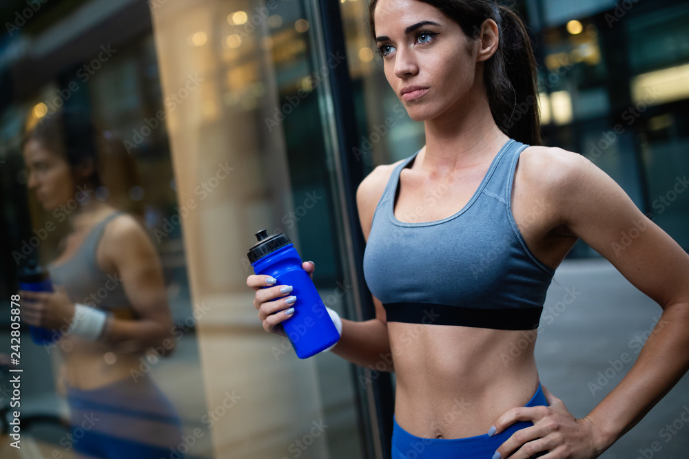 Picture of young attractive happy fitness woman outdoor Picture of young attractive happy fitness woman outdoor