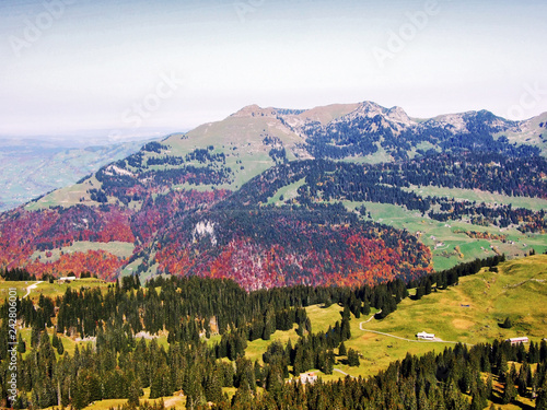 A breathtaking view from the top of Brisi in the Churfirsten mountain chain - Canton of St. Gallen, Switzerland photo