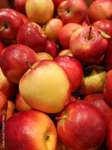 Ripe red apples as background
