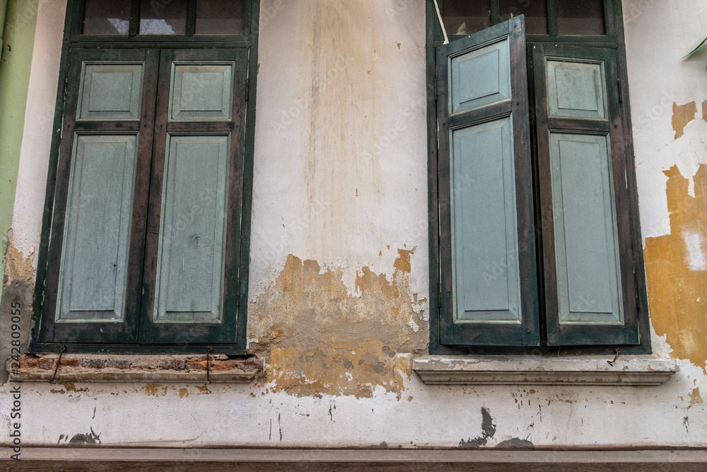 Fototapeta premium Close up beautiful traditional green windows background.