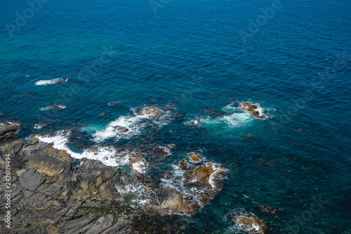 view of the sea and rocky shore