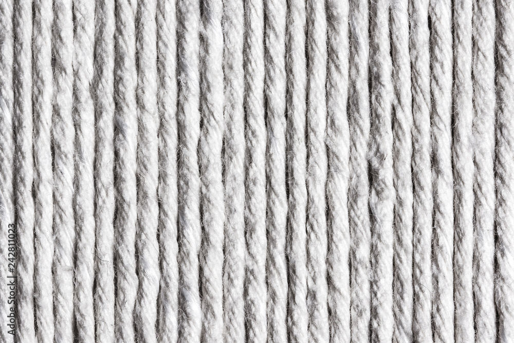 White cotton linen rope background. Parallel lines pattern. White cotton linen rope background. Parallel lines pattern.