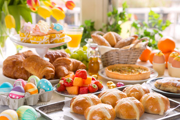Table with delicatessen ready for Easter brunch