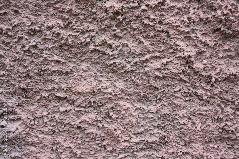 Wall finished with cement mortar finished by hand, rough, rustic Wall finished with cement mortar finished by hand, rough, rustic