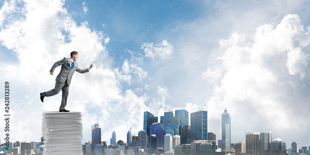 Precise businessman in suit running with phone. Precise businessman in suit running with phone.