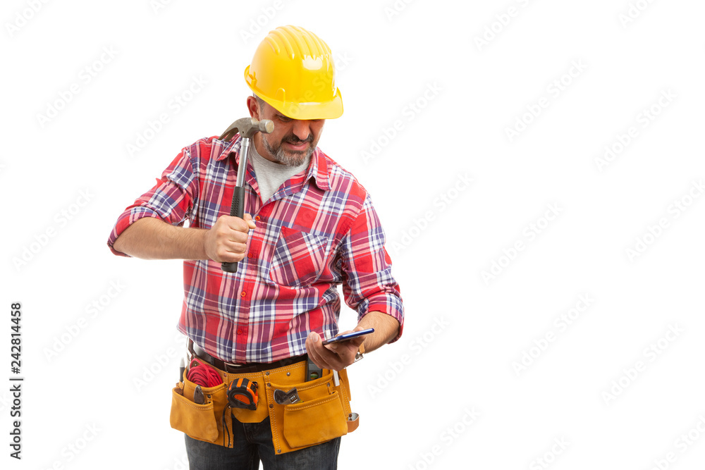 Builder preparing to break phone screen. Builder preparing to break phone screen.
