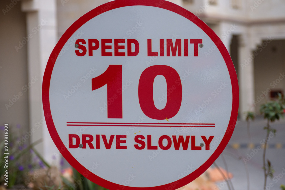 Drive Slowly - 10km/h - Red/white sign