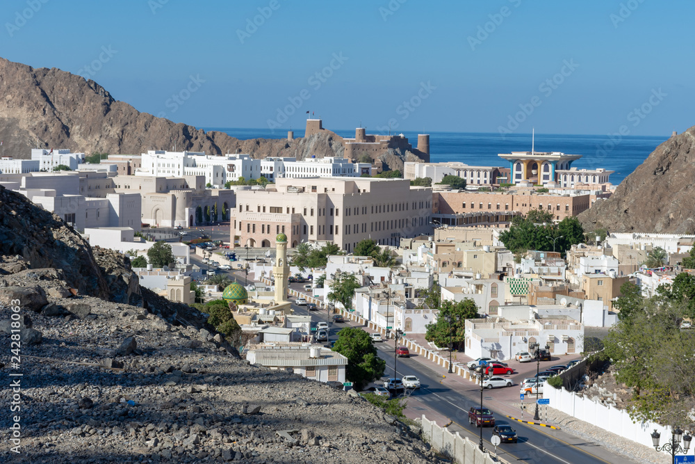 Old Town, Muscat Oman from a hill looking down to the town and sea along with the museums and fortress.