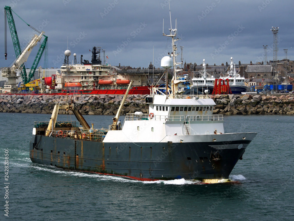Trawler Leaving Port. Trawler Leaving Port.