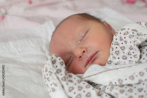 Sleeping newborn baby boy. Little newborn boy. Close-up portrait of a beautiful sleeping baby.