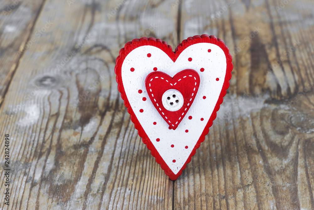 Valentine's Day. red heart on the background of old boards Valentine's Day. red heart on the background of old boards