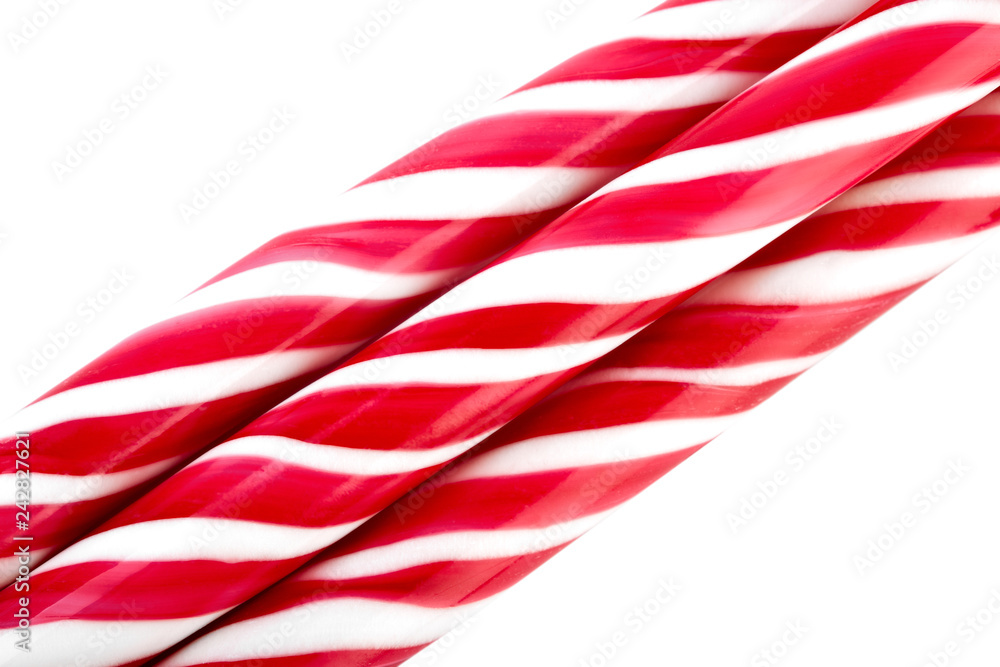 Christmas candy can isolated on a white. Red and white Christmas caramel. Christmas candy can isolated on a white. Red and white Christmas caramel.